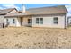 House with covered patio and fenced-in backyard at 276 Villa Grande Dr, Locust Grove, GA 30248