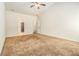 Spacious bedroom with ceiling fan and carpet at 276 Villa Grande Dr, Locust Grove, GA 30248