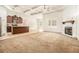 Open concept kitchen with island and dark wood cabinets at 276 Villa Grande Dr, Locust Grove, GA 30248