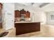 Island kitchen with granite countertops and ample cabinet space at 276 Villa Grande Dr, Locust Grove, GA 30248