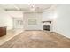 Living area with fireplace and lots of natural light at 276 Villa Grande Dr, Locust Grove, GA 30248
