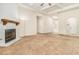 Living room with a fireplace and neutral decor at 276 Villa Grande Dr, Locust Grove, GA 30248