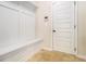 Mudroom with built-in bench and storage at 276 Villa Grande Dr, Locust Grove, GA 30248