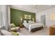 Beautiful bedroom featuring a king size bed, stylish decor and designer paint at 584 Silver Moon Dr, Loganville, GA 30052