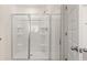 Glass shower stall with a chrome frame and showerhead at 345 Sound Cir # 134, Stockbridge, GA 30281