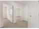Hallway with bedroom and coat closet entrances at 487 Reflection Dr # 34, Stockbridge, GA 30281