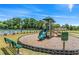Community playground with benches and an adjacent pool provides hours of outdoor fun at 487 Reflection Dr # 34, Stockbridge, GA 30281