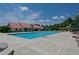 Relaxing community pool with a lifeguard stand and lounge chairs at 131 Paddington Pl, Acworth, GA 30101