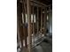 Exposed wooden beams, plumbing and electrical in the basement under construction at 3230 Vanderbilt Nw Ln, Atlanta, GA 30318