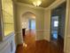 A spacious home with wooden floors, archway to other rooms, and custom trim and molding at 2300 Peachford Rd # 1209, Atlanta, GA 30338