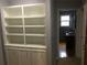 Built-in shelving and cabinets in hallway at 2218 Beech Valley Se Dr, Smyrna, GA 30080