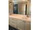 Bathroom featuring a double vanity with a marble countertop and a separate shower at 148 Murray Hill Ne Ave, Atlanta, GA 30317