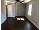 Bedroom featuring hardwood floors, natural light, and a ceiling fan at 148 Murray Hill Ne Ave, Atlanta, GA 30317