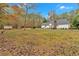 Large backyard with open space and wooded backdrop at 1035 Dorris Rd, Douglasville, GA 30134