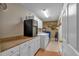 Bright laundry room with washer, dryer, and ample counter space at 1035 Dorris Rd, Douglasville, GA 30134