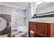 Bathroom featuring tiled shower, tile floors, and vanity at 1801 Laurel Creek Se Trl, Smyrna, GA 30080