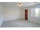 Bright bedroom with ceiling fan and neutral carpeting at 1801 Laurel Creek Se Trl, Smyrna, GA 30080