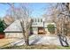 Two-story house with stone accents and a large deck at 1801 Laurel Creek Se Trl, Smyrna, GA 30080