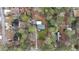 Aerial view of a house surrounded by trees at 589 Northern Ave, Clarkston, GA 30021