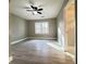 Cozy bedroom with ceiling fan, wood flooring, and a bright, airy feel at 589 Northern Ave, Clarkston, GA 30021