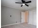 View of the bedroom, showing the closet and ceiling fan at 589 Northern Ave, Clarkston, GA 30021