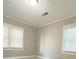 View of the bedroom featuring two windows at 589 Northern Ave, Clarkston, GA 30021