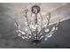 Close up of a modern crystal chandelier with unique design and bright light at 589 Northern Ave, Clarkston, GA 30021