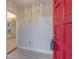 Inviting foyer with view to the living room, featuring a modern chandelier at 589 Northern Ave, Clarkston, GA 30021