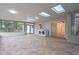 Spacious sunroom featuring skylights, windows, washer and dryer at 589 Northern Ave, Clarkston, GA 30021