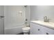 Well-lit bathroom with a shower/tub combo and a modern vanity with marble countertop at 1039 Ridgecrest Dr, Smyrna, GA 30080