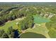 Aerial view of golf course and community lake at 6202 Talmadge Nw Way, Acworth, GA 30101