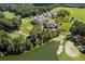 Aerial view of community clubhouse and golf course at 6202 Talmadge Nw Way, Acworth, GA 30101