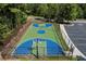 Community basketball court with blue and green surface at 6202 Talmadge Nw Way, Acworth, GA 30101