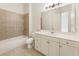 Clean bathroom with tub, toilet and vanity at 6202 Talmadge Nw Way, Acworth, GA 30101