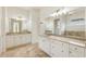 Elegant bathroom with double vanity and granite countertop at 6202 Talmadge Nw Way, Acworth, GA 30101