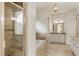 Bathroom with shower, tub and double vanity at 6202 Talmadge Nw Way, Acworth, GA 30101