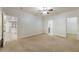 Spacious bedroom with carpet and access to other rooms at 6202 Talmadge Nw Way, Acworth, GA 30101