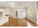 Bright dining room with hardwood floors and chandelier at 6202 Talmadge Nw Way, Acworth, GA 30101