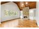 Gathering room with stone fireplace and built-in shelves at 6202 Talmadge Nw Way, Acworth, GA 30101