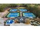 Community tennis courts with surrounding landscape at 6202 Talmadge Nw Way, Acworth, GA 30101