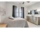 Cozy bedroom with a serene atmosphere, accentuated by soft natural light and elegant furnishings at 3621 Vinings Slope Se # 1537, Atlanta, GA 30339