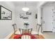 Bright dining room featuring a glass table, decorative accents and a neutral color palette at 3621 Vinings Slope Se # 1537, Atlanta, GA 30339