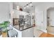 This modern kitchen features granite countertops, stainless steel appliances, and a stylish breakfast bar at 3621 Vinings Slope Se # 1537, Atlanta, GA 30339