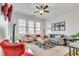 Cozy living room with hardwood floors, neutral furniture, and abundant natural light at 3621 Vinings Slope Se # 1537, Atlanta, GA 30339