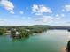 Aerial view of lakefront community with marina and homes at 3545 Silver Vista Ct, Cumming, GA 30041