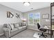 Bedroom with built-in workspace and window seat at 3545 Silver Vista Ct, Cumming, GA 30041