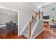 Elegant entryway with hardwood floors and staircase at 3545 Silver Vista Ct, Cumming, GA 30041