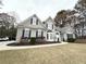 Two story home with landscaping at 3545 Silver Vista Ct, Cumming, GA 30041