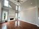 Spacious Gathering room with hardwood floors and fireplace at 3545 Silver Vista Ct, Cumming, GA 30041