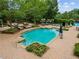 Community pool with plenty of lounge chairs at 3545 Silver Vista Ct, Cumming, GA 30041